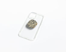 Load image into Gallery viewer, WMC Dalmatian Jasper phone grip displayed on a clear phone case
