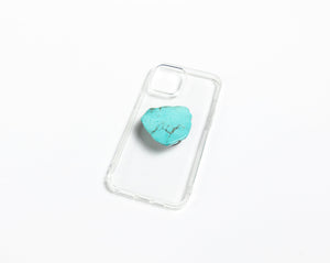 WMC Turquoise phone grip displayed on a clear phone case