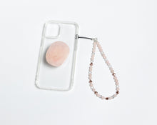 Load image into Gallery viewer, WMC Universal Love phone charm displayed on a clear phone case with Rose Quartz phone grip
