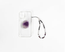 Load image into Gallery viewer, WMC Aquarius Zodiac phone charm displayed on a clear phone case with Amethyst phone grip
