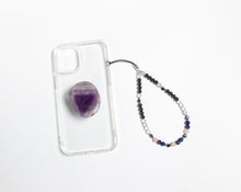 Load image into Gallery viewer, WMC Libra Zodiac phone charm displayed on a clear phone case with Amethyst phone grip
