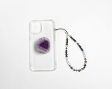 Load image into Gallery viewer, WMC Virgo Zodiac phone charm displayed on a clear phone case with Amethyst phone grip

